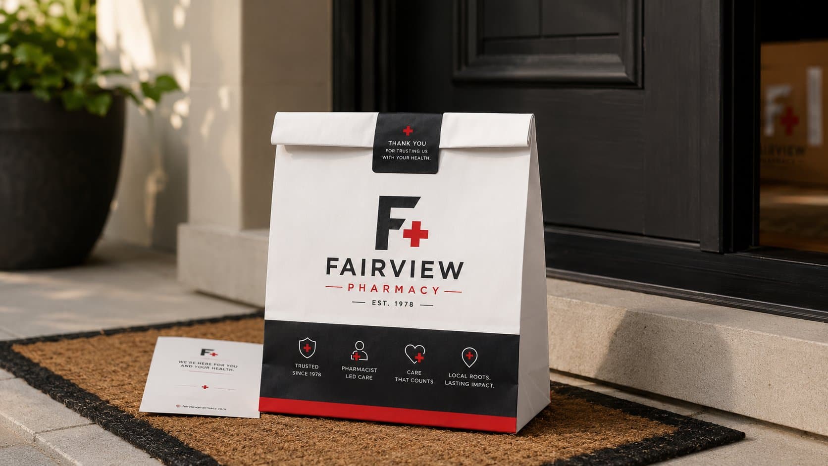 Fairview Pharmacy branded paper bag delivery on a doorstep with thank you note and our four pillars: trusted since 1978, pharmacist led care, care that counts, local roots